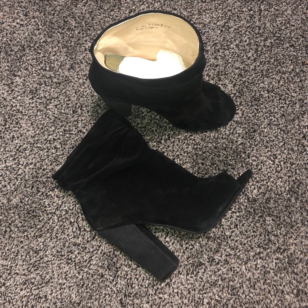 Kristin Cavallar black open toed heels.